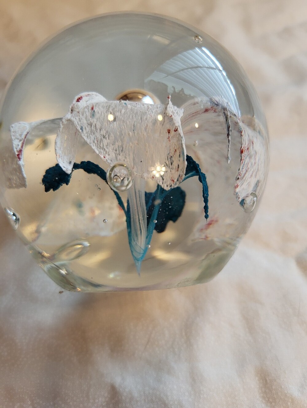 Handblown Glass Art 3 x 3 In. Sphere with White and Teal Floral Core Paperweight - Picture 6 of 10